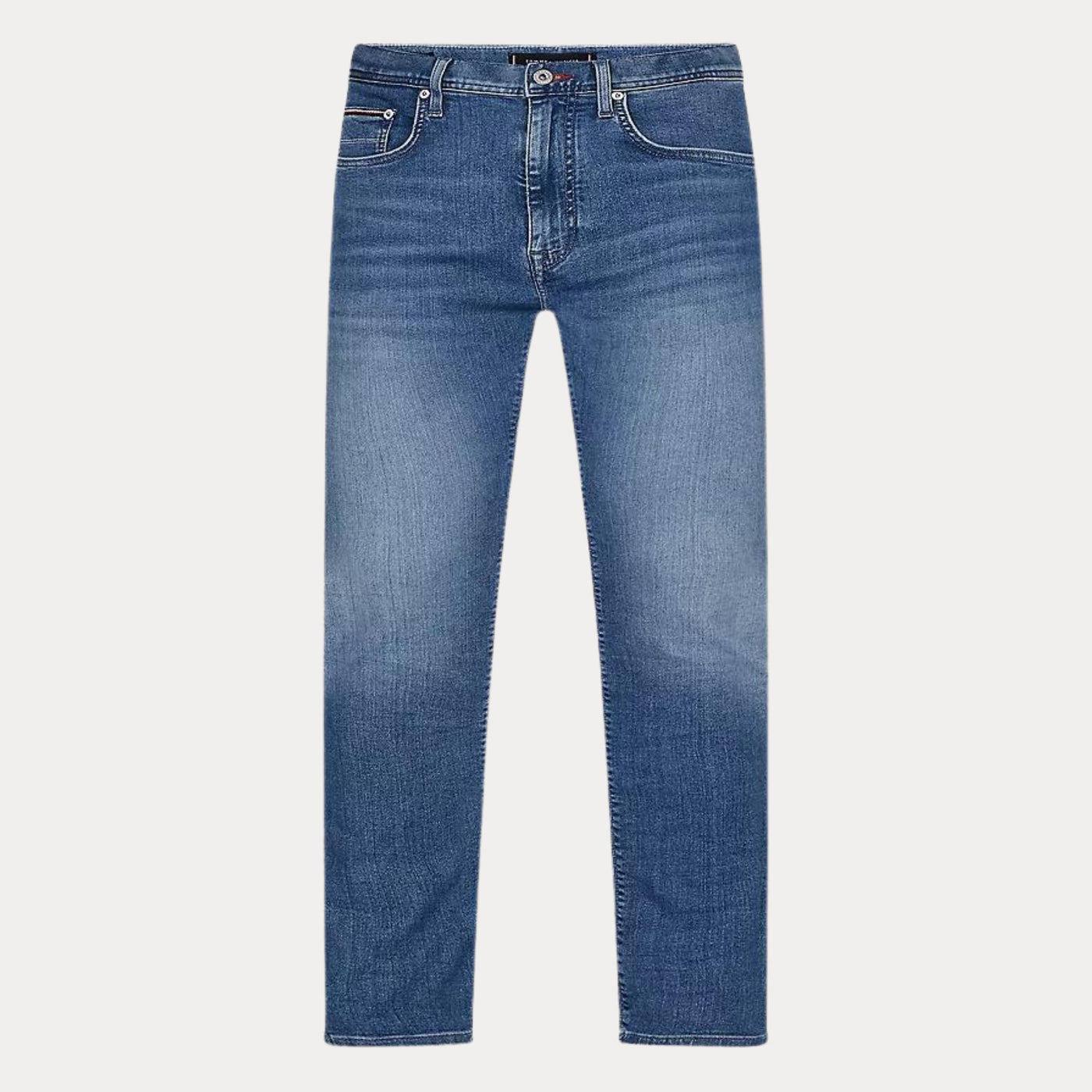 Jeans da uomo firmati Tommy Hilfiger slim, modello cinque tasche con scoloriture frontali e sul retro. Visuale frontale. 