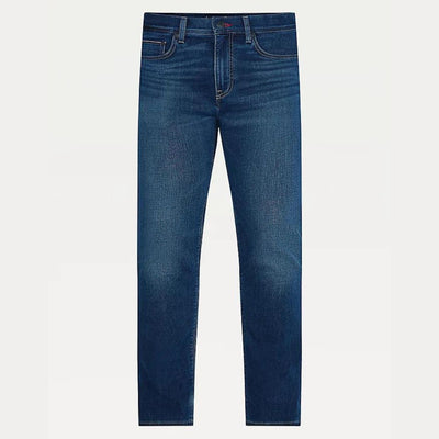 Jeans da uomo firmati Tommy Hilfiger in misto cotone con scoloriture su cosce e ginocchia. Visuale frontale. 
