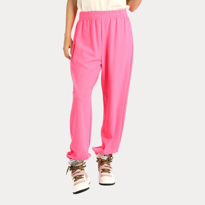 Pantalone rosa tinta unita con elastico in vita e alle caviglie. Parte frontale. 