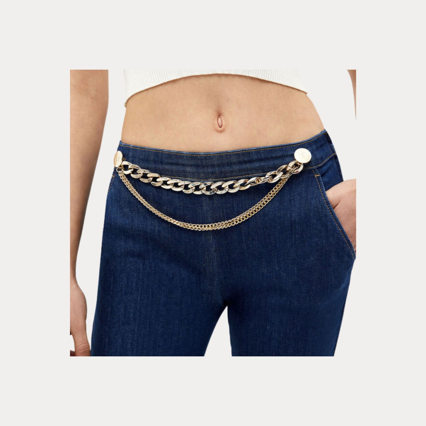 Jeans Donna con catena dorata in vita
